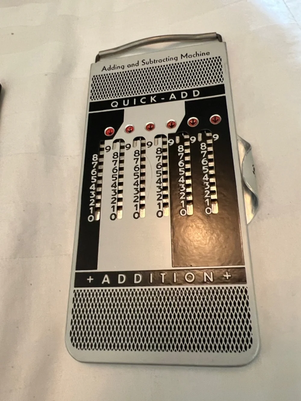 1950’s - 1960’s vintage Quick-Add Handheld Adding/Subtracting Machine - Silver